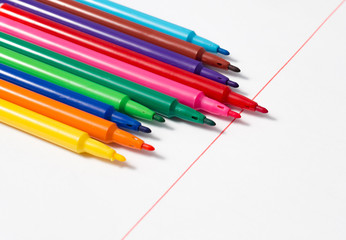 Concept leadership. color pens close-up.