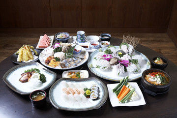 A traditional korean tray meal on wooden table