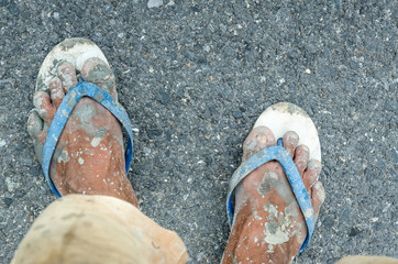 The feet of a old man who are in pain. And the hard work of the people.