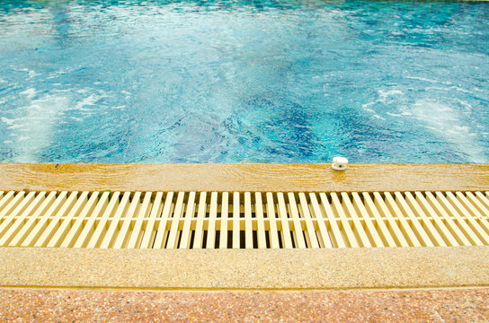 swimming pool and gutter water overflow and sandwash terrace. at the hotel.