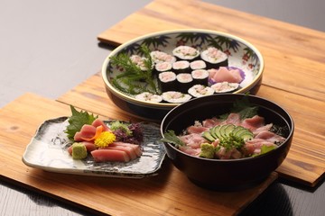 Tuna cuisine in Japanese style on wooden tray in restaurant