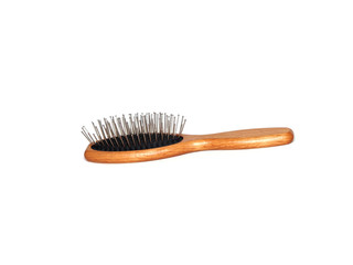 Hair Brush. Wooden hair brush isolated on white background.