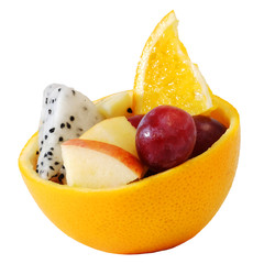 Fototapeta na wymiar mix fruit salad Served in creative orange rind bowl with white isolate background