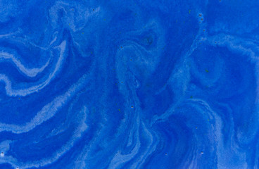 Dark blue liquid background. Marbled pattern. Acrylic surface