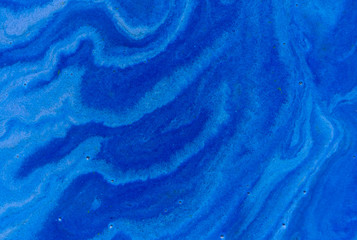 Dark blue liquid background. Marbled pattern. Acrylic surface