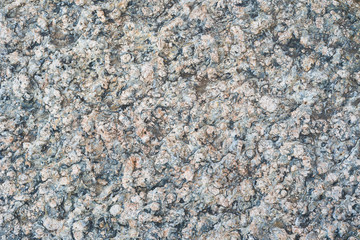 The rough surface of the stone background 