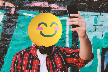 Emoji Head man taking a selfie