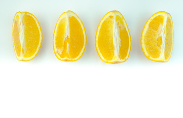 Slices of orange on a white background.