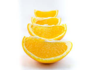 Fototapeta na wymiar Slices of orange on a white background.