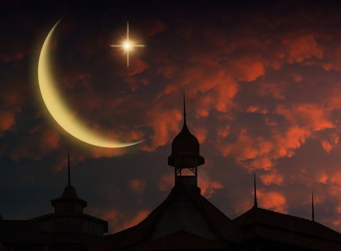 The beams of the sun lighting a mosque silhouettesilhouette in night sky with crescent moon   . ramazan mubarak card, Red roofs of houses at sunrise. The rooftop from a metal tile