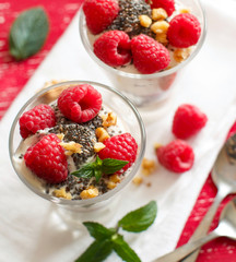 Yogurt with chia seeds, walnuts and raspberries