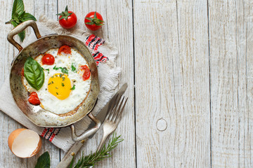Fried egg on an old frying pan