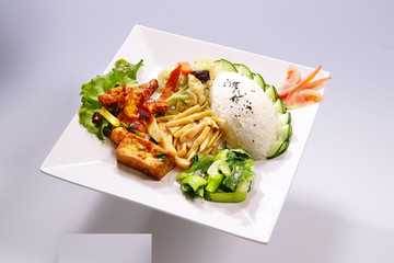 Fragrant fried fish row, Kung Pao Chicken with vegetable on whit