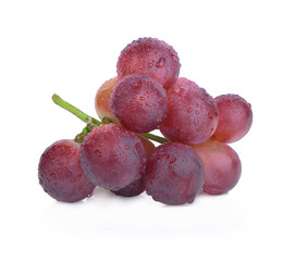 fresh red grapes with water drops isolated on white