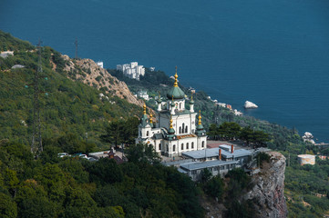 Fototapeta premium Top view Church of Holy Resurrection on Black sea coast, Crimea, Russia