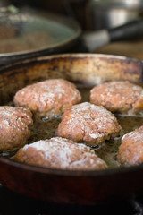 Cutlets from minced meat fried in a pan