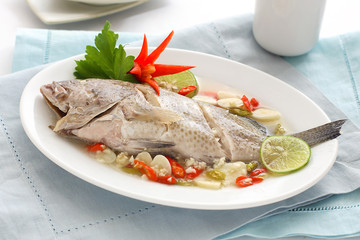Steamed Fish in a plate, Thai food