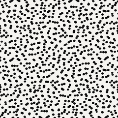 Abstract seamless repeat pattern in black and white. Dots texture background.