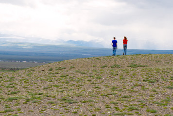 Couple hiking steppe