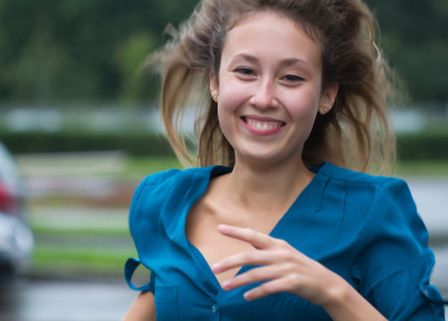 Girl running smiling sucessfull