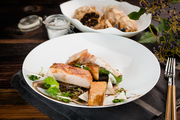 Summer terrace with fried pork cutlet, cumin, mushroom and herbs