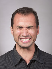 Studio portrait of a distraught man