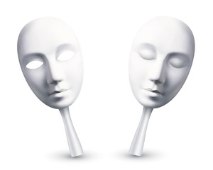 White carnival masks with open and closed eyes