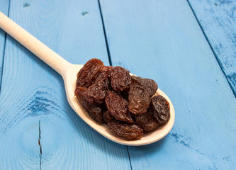 the raisins on a blue board