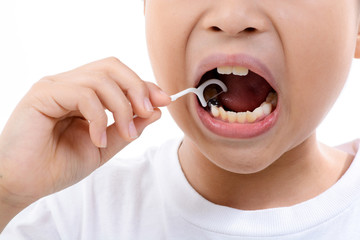 Fototapeta premium Boy use toothpick