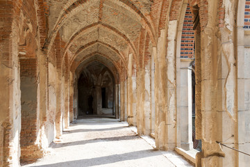 Fototapeta na wymiar Arch way in ancient palace. Marianne Wilhelmine Oranska Palace in Kamieniec Zabkowicki, Poland.