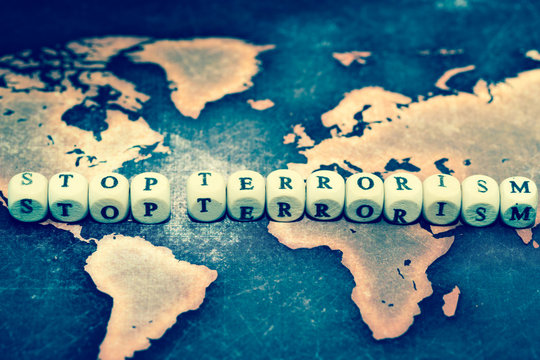 STOP TERRORISM on grunge world map