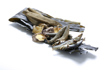 Dried food of mushroom and mackerel fish on white background