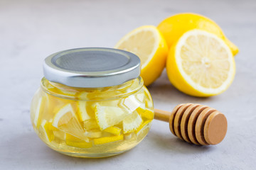 Lemon and honey mix for citrus tea in glass jar