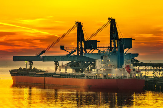 Big ship under loading coal in Port of Gdansk, Poland.