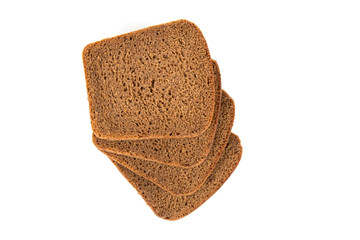 Sliced black rye bread on white background