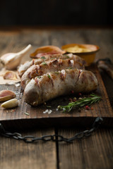 Grilled pork sausages with herbs and spices