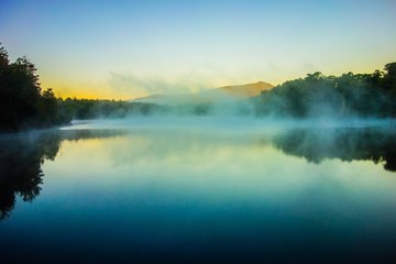 Fototapeta na wymiar Grandfather Mountain Sunrise Reflections on Julian Price Lake in