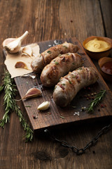 Grilled pork sausages with herbs and spices