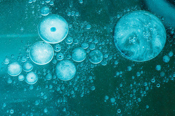 oil  slough on water surface with blue background