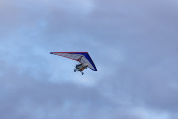 trike on a background of clouds