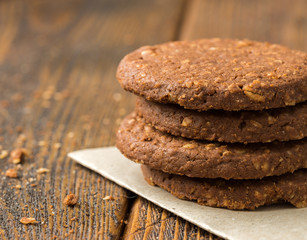 Chocolate biscuits on wooden table.