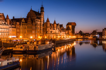 Gdansk old town with harbor and medieval crane in the night