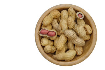 Dried peanuts in closeup isolatd on white