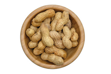 Dried peanuts in closeup isolatd on white