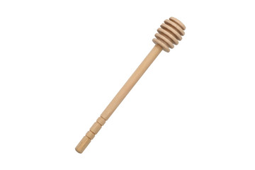 wooden honey drizzler on white background