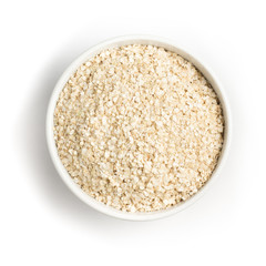 Quinoa Flakes into a bowl. Super Food.