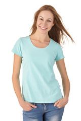 Fototapeta premium Attractive girl in t-shirt and jeans smiling.