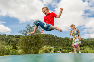 Kids jumping on trampoline