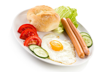 Breakfast - fried egg and sausages 