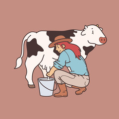 Woman milking cow